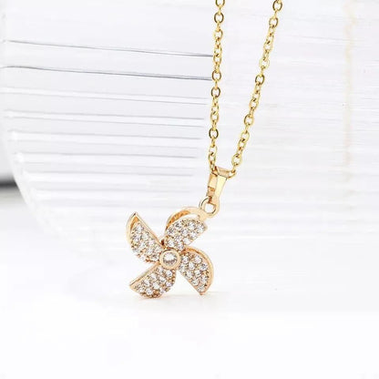 Mesmerizing Flower Pinwheel Rotating Necklace – A Touch of Elegance & Motion